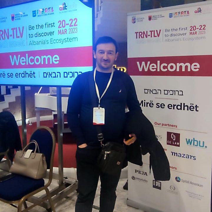 TRN-TLV Tech Week Conference in Albania on March 2023. Screen with a welcome announcement, and a 